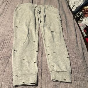baggy grey sweats with cut outs